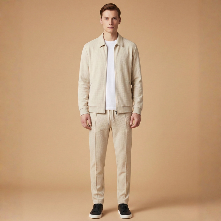 Stylish streetwear tracksuit for men, showcasing a zip jacket and casual pants.