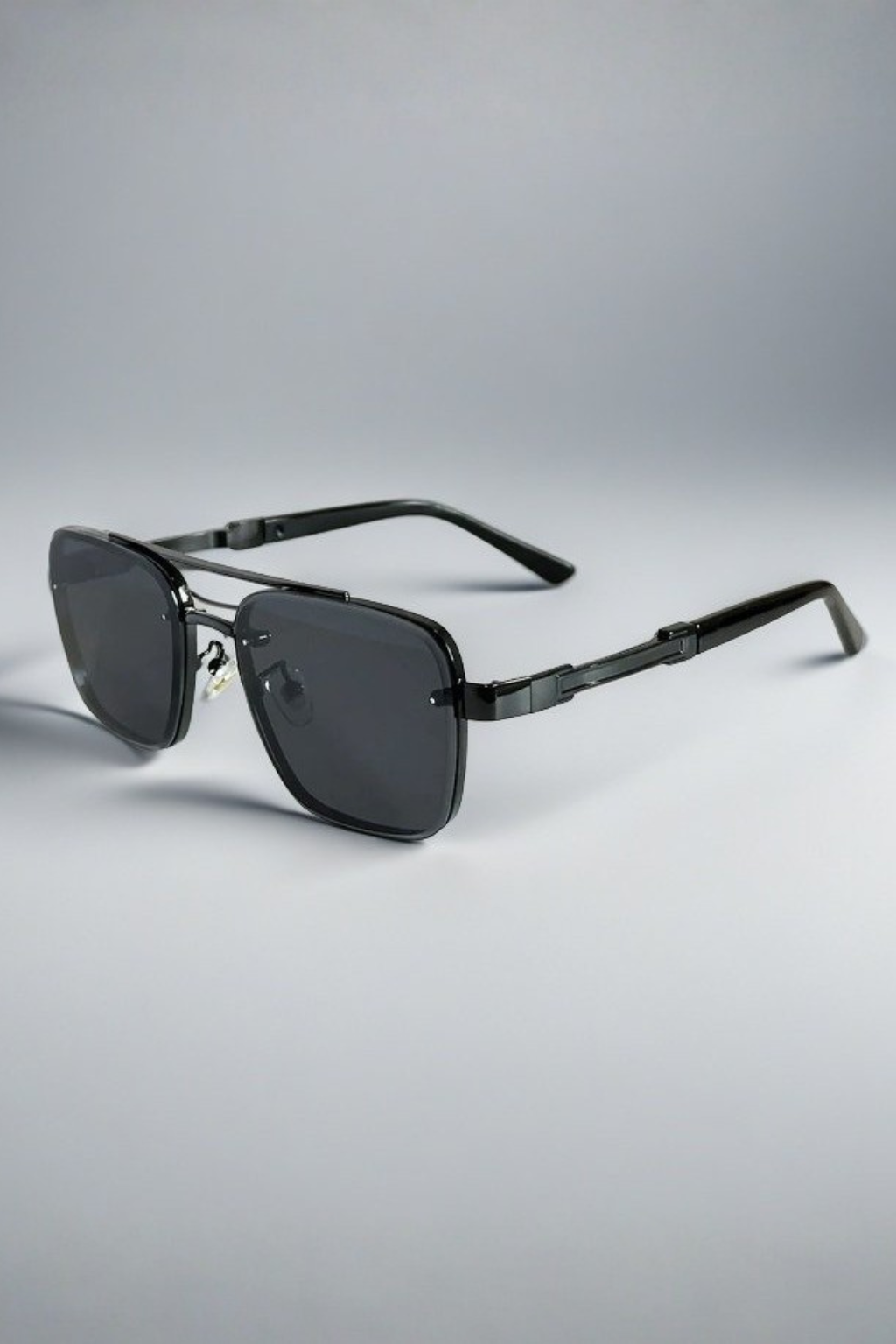 Trendy men's aviator square sunglasses with a distinctive gold metal frame, a fashion staple.