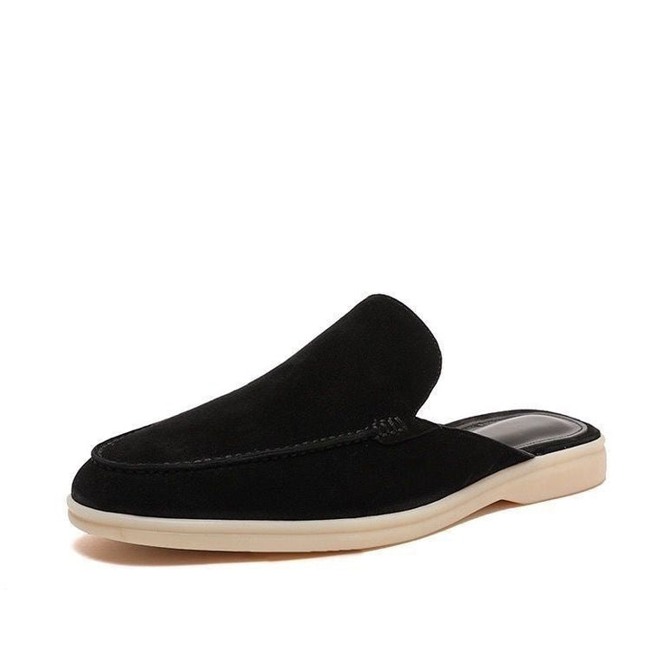 Modern men's backless loafers with a sleek design, ideal for versatile warm-weather casual fashion.