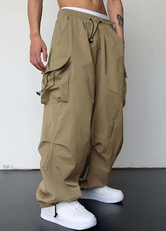 Stylish men's baggy wide leg cargo pants with utility pockets for ultimate casual comfort.