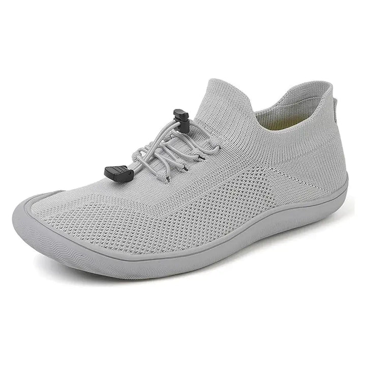 Close-up of toggle lace system on barefoot sneakers