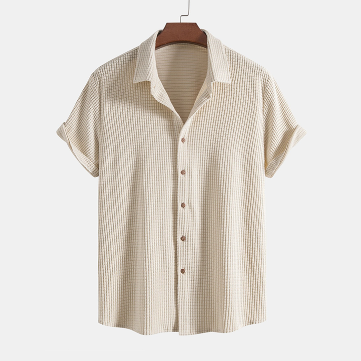 Coordinated men's two-piece casual set in beige, ideal for summer beachwear and relaxed fashion.