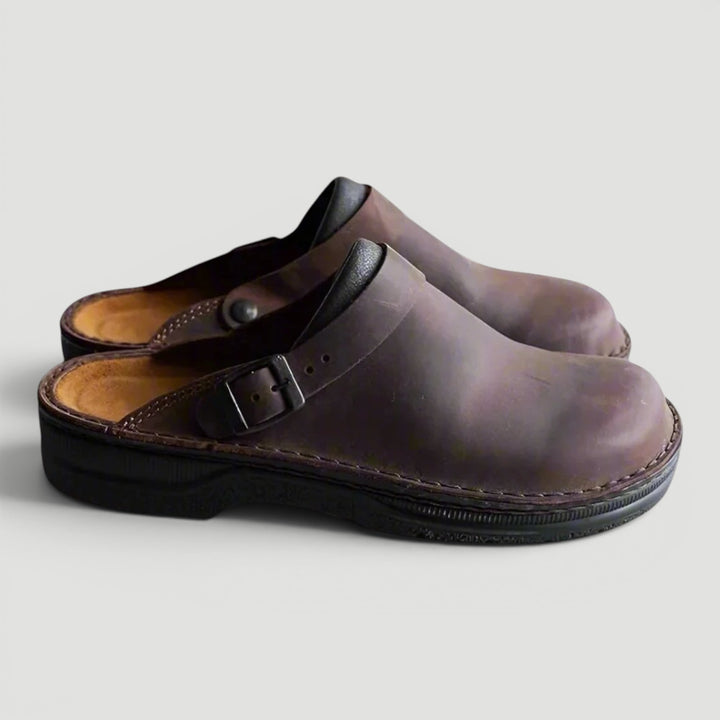 Black men's slip-on orthopedic comfort clogs. Enjoy all-day foot support and casual style.
