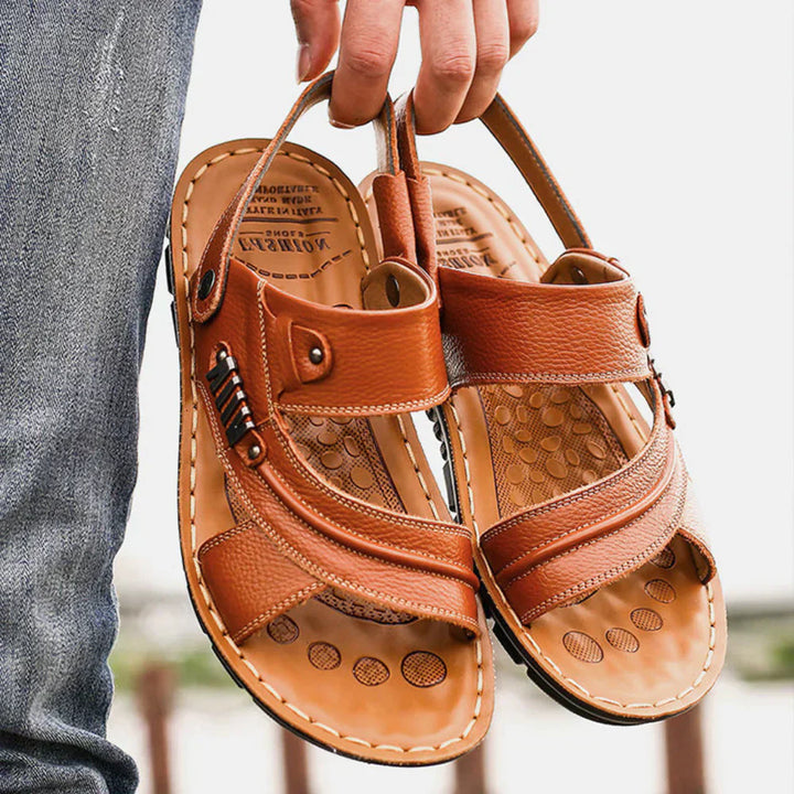 Man wearing adjustable fit walking sandals, showcasing comfort and support features.