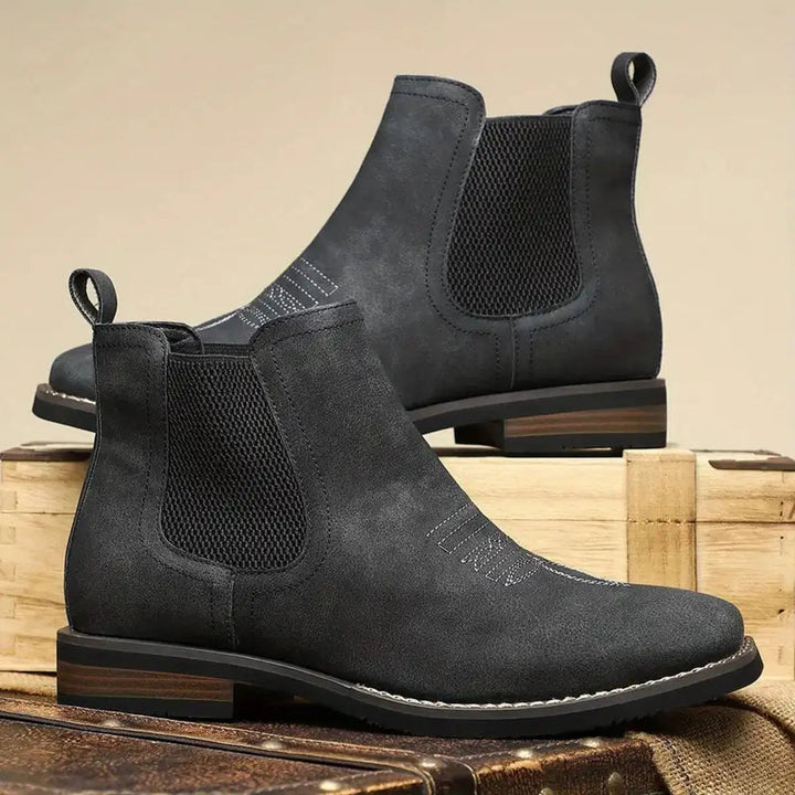 Classic black men's ankle boots, Chelsea style, enhanced with elegant western stitch embellishment.