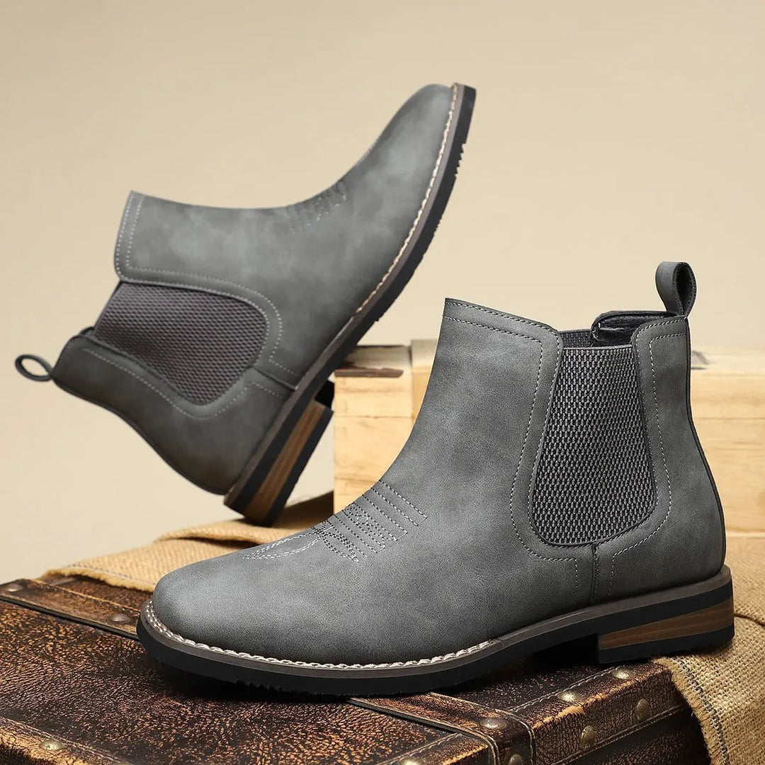 Dress up your look with men's black Chelsea boots, western stitch detail, perfect for smart occasions.