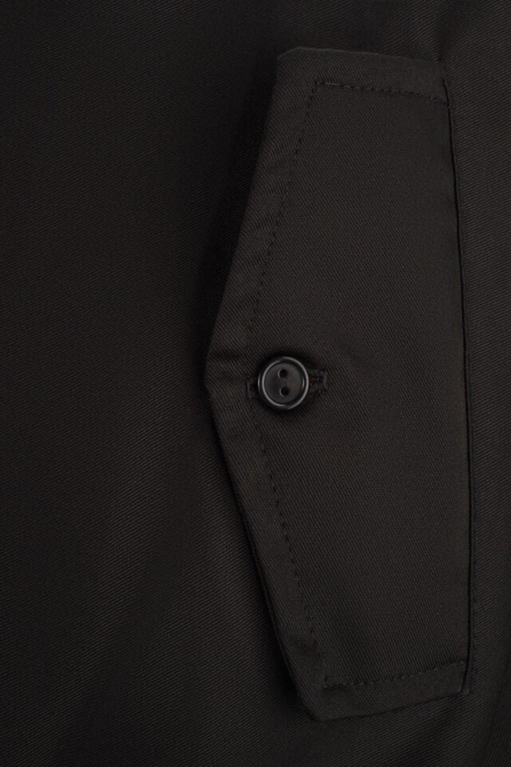 Durable men's outerwear: black Harrington jacket with comfortable tartan lining, perfect for fall.