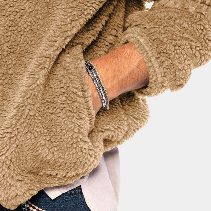 Cozy men's hooded jacket in a rich color, offering ultimate warmth and comfort for winter adventures.