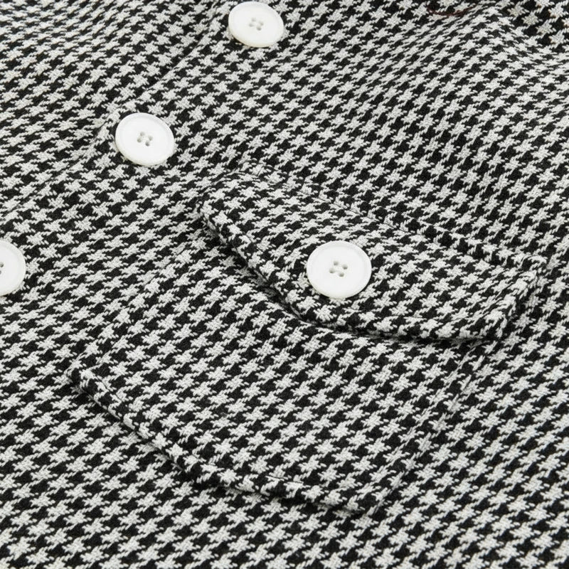 Versatile men's houndstooth shacket, a long sleeve patterned outerwear piece. Great as a casual button-down jacket.