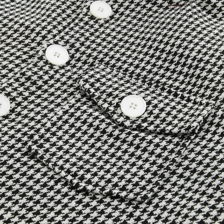 Versatile men's houndstooth shacket, a long sleeve patterned outerwear piece. Great as a casual button-down jacket.