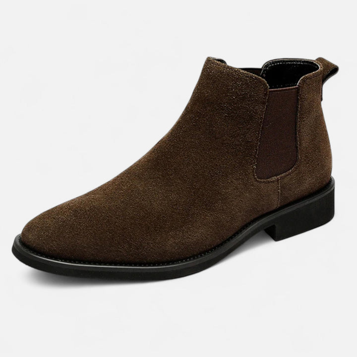 Men's black leather Chelsea elevator boots for height increase and smart casual style.
