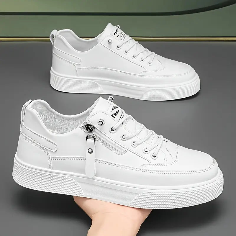 Men's smart casual footwear: black leather side zip trainers.
