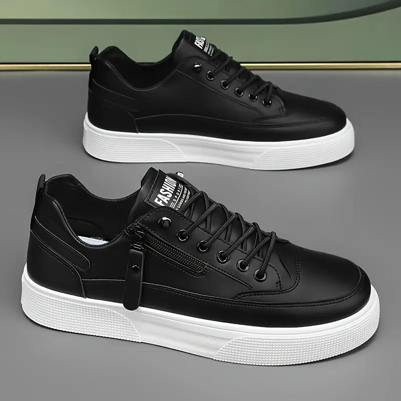 Smart casual black leather trainers with side zip detail.