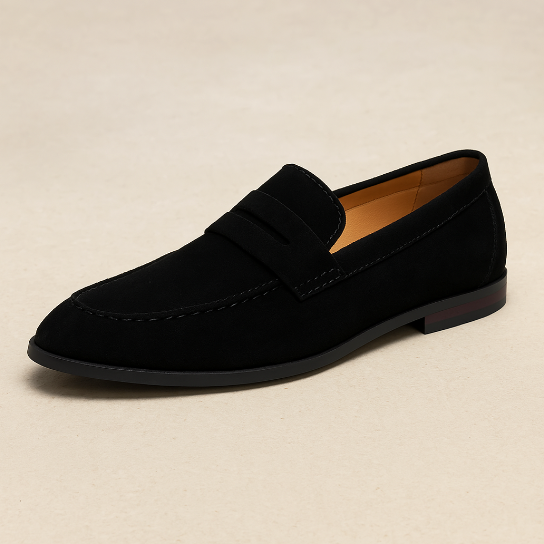 Men's black leather slip-on penny loafers, comfortable and versatile for casual or formal wear.