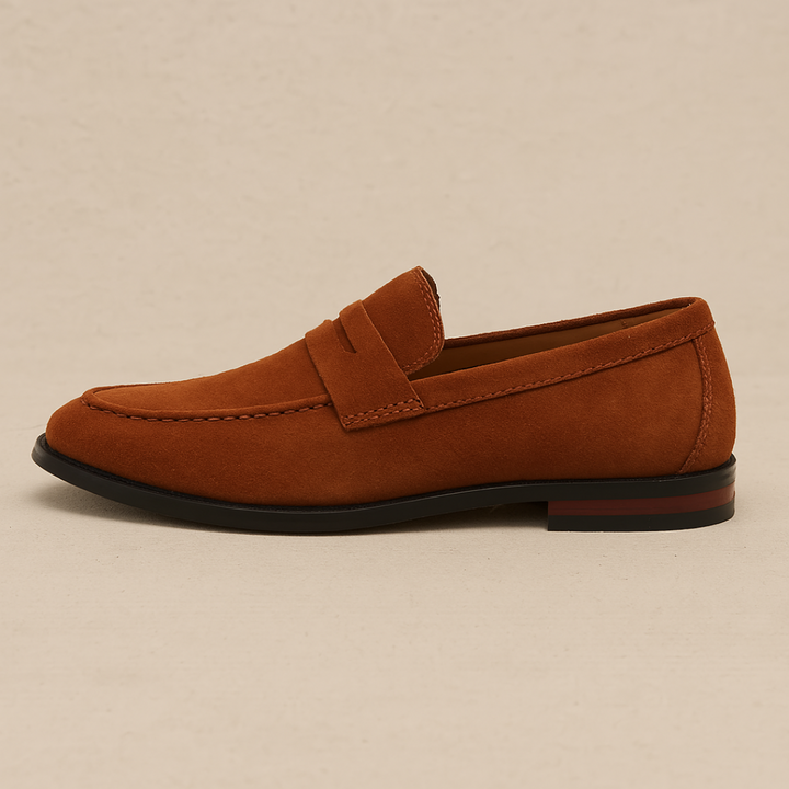 Comfortable men's slip-on loafers in tan leather, perfect for all-day wear and easy on-and-off.