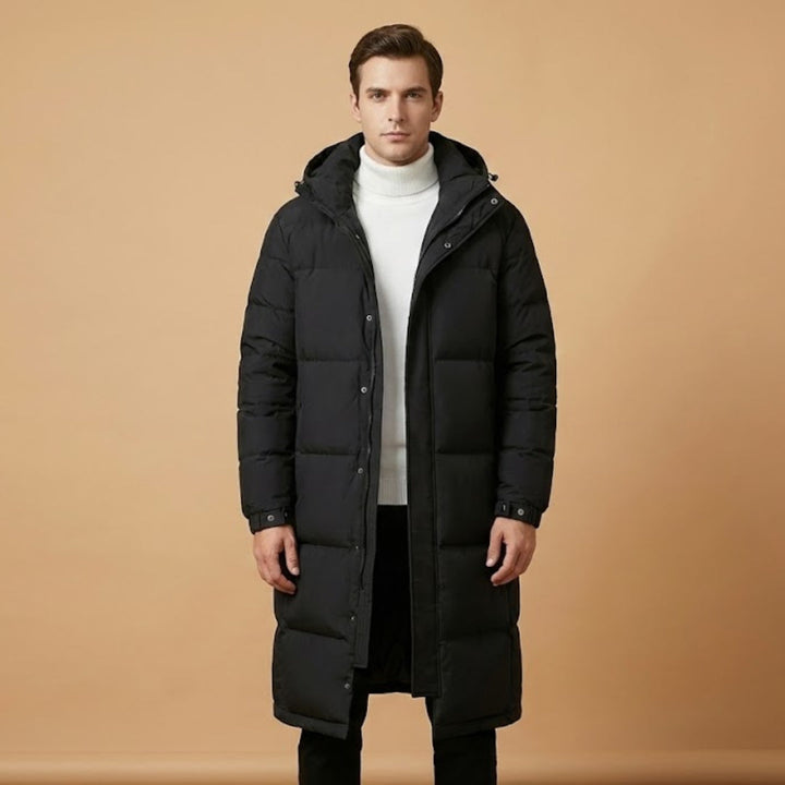 Stylish men's quilted winter coat featuring a protective hood, double closure, and practical hip pockets.