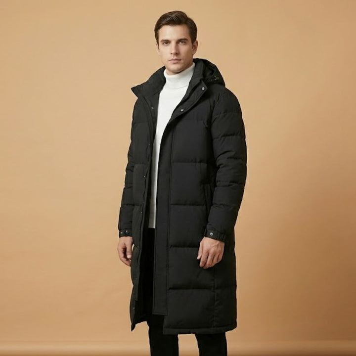Men's warm hooded long winter jacket, ideal outerwear for extreme cold. Features elegant quilting and hip pockets.