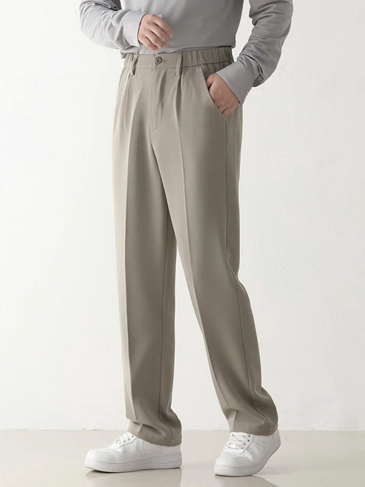 Versatile men's black tailored trousers, relaxed fit, ideal for business and casual wear, sophisticated fashion.