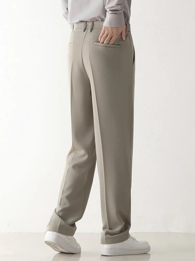 Comfortable & sophisticated men's black relaxed fit tailored chino trousers, polyester blend for business casual.