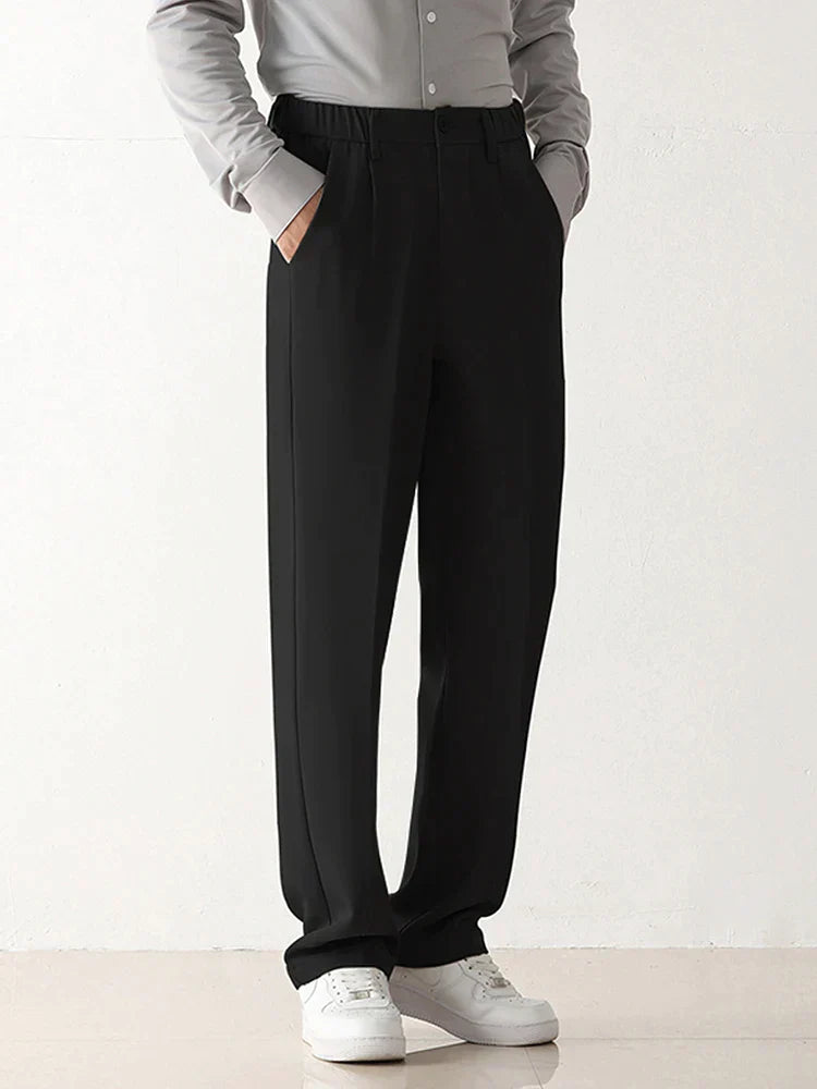 Black men's tailored chino trousers, relaxed fit, offering a sophisticated look for both business and casual outfits.