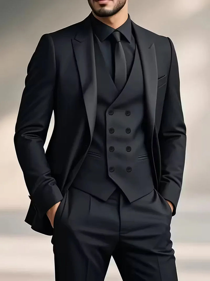 Men's black slim fit three-piece suit with double-breasted waistcoat for formal events.