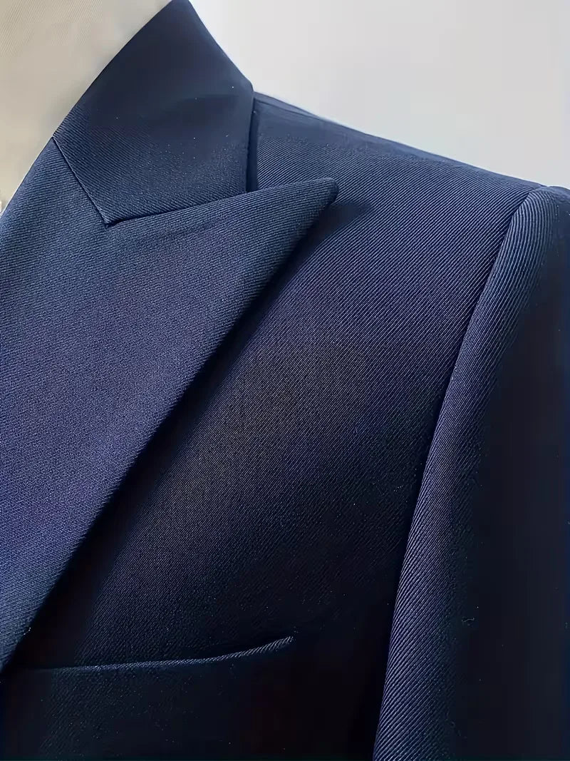 Men's three-piece suit, emphasizing the double-breasted waistcoat design.