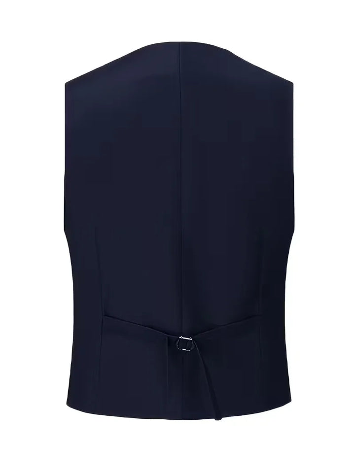 Groom's elegant black slim fit three-piece wedding suit for his big day.