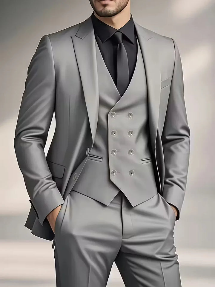 Men's formal wear: a sophisticated burgundy slim fit three-piece suit.
