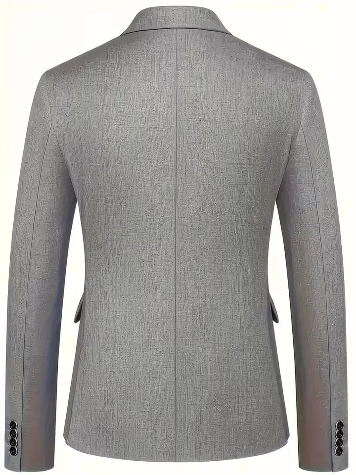 High-quality men's slim fit 3-piece navy suit, suitable for formal occasions.