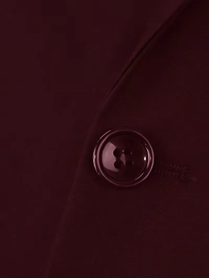 Contemporary men's black formal suit, slim fit and three-piece design.