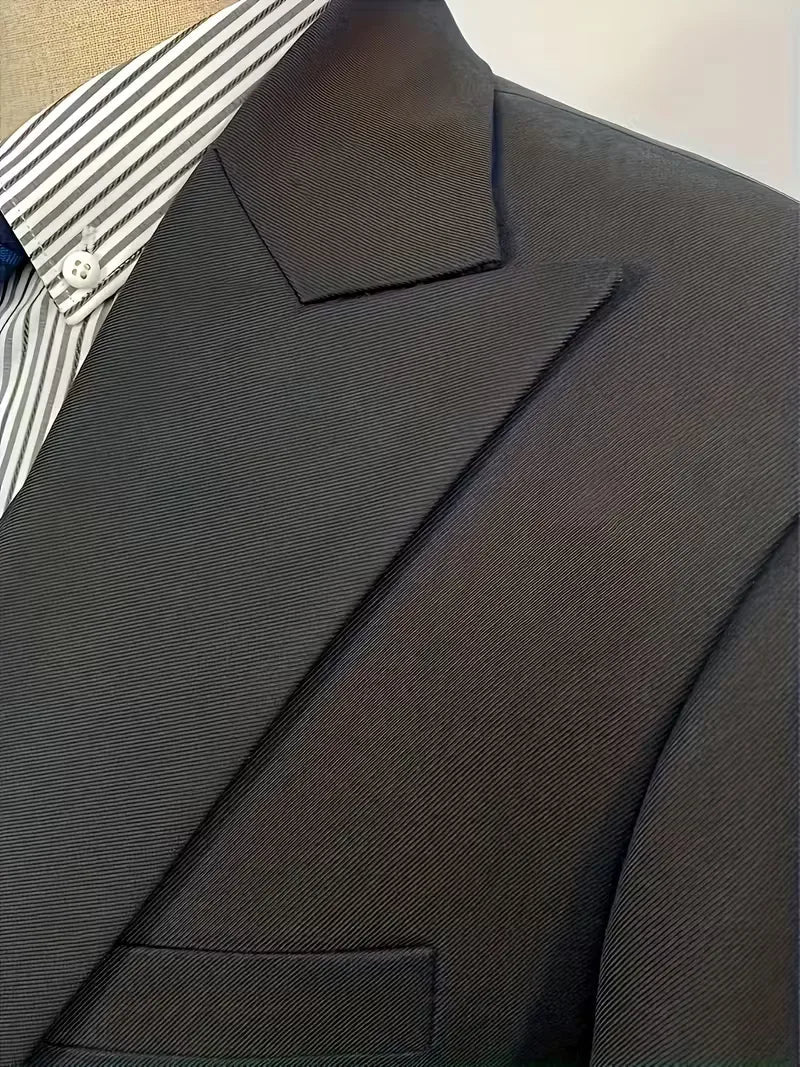 Burgundy men's slim fit three-piece suit, ideal for special occasions.