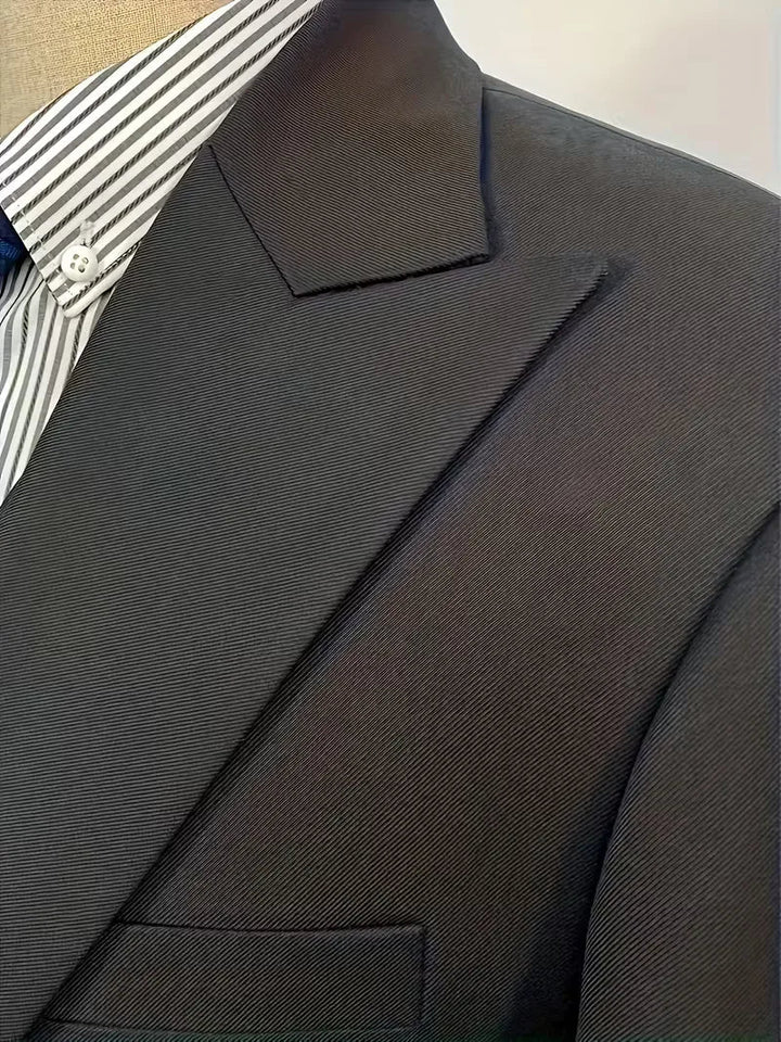 Burgundy men's slim fit three-piece suit, ideal for special occasions.