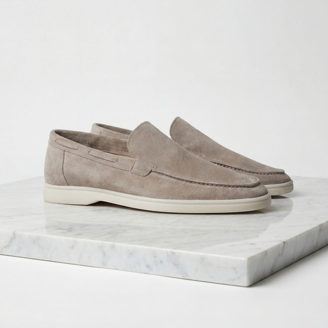 Men's black slip-on dress loafers for versatile everyday and formal style.