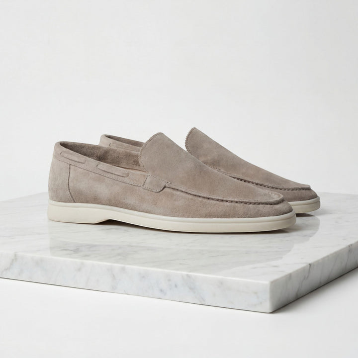 Men's black slip-on dress loafers for versatile everyday and formal style.