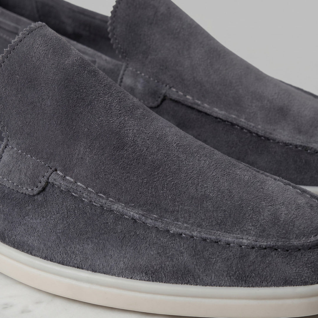Elegant black slip-on loafers, men's comfortable dress shoes for modern style.