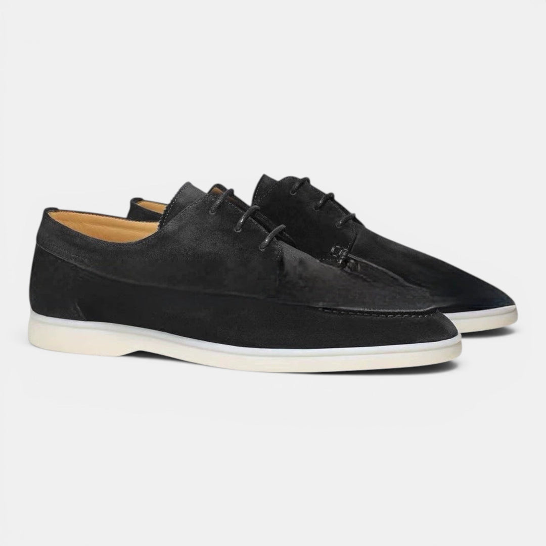 Men's black slip-on loafers, smart casual style for everyday wear, comfortable and versatile footwear.