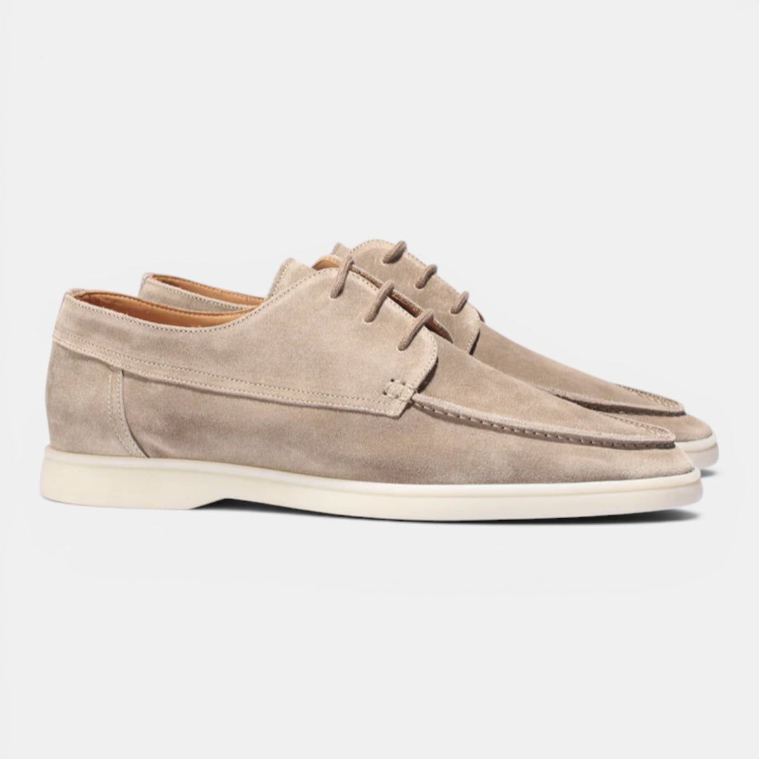 Comfortable mens slip-on loafers in navy, ideal for smart casual outfits, a versatile everyday shoe.