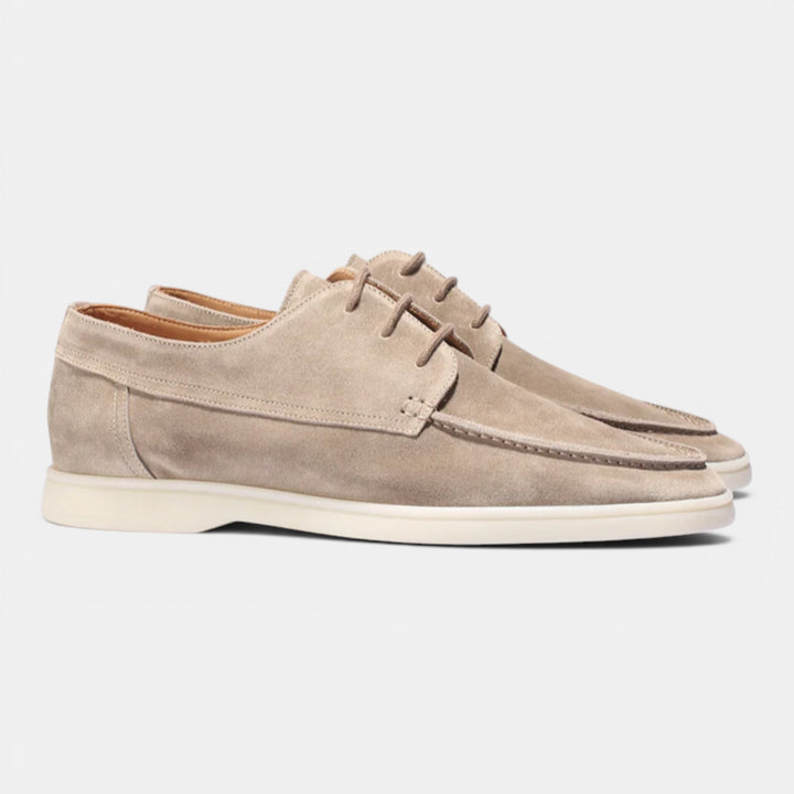 Comfortable mens slip-on loafers in navy, ideal for smart casual outfits, a versatile everyday shoe.