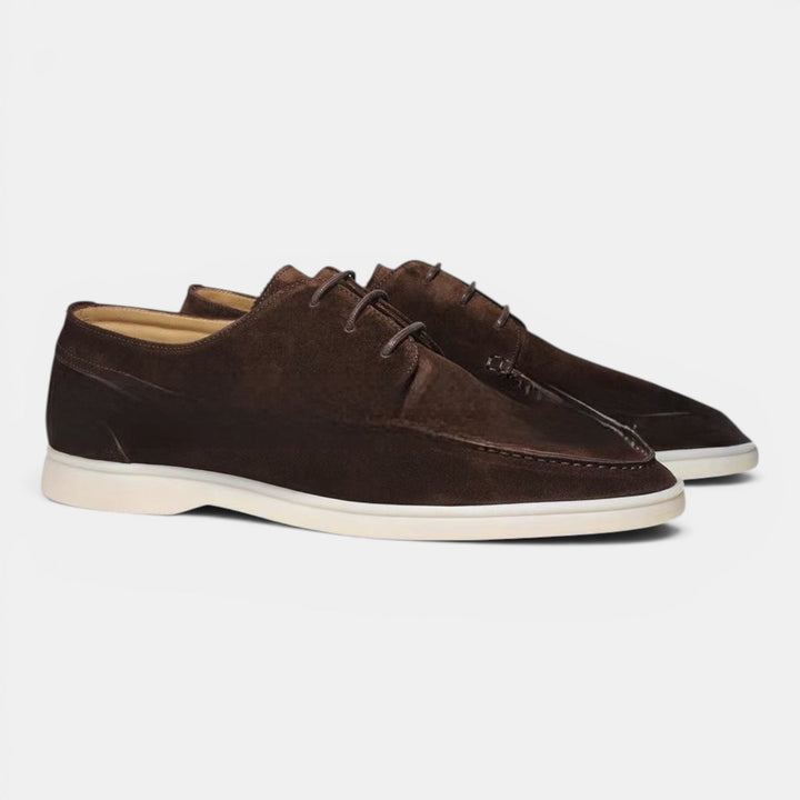 Modern smart casual mens loafers, sleek black slip-on shoes, combining comfort and mens fashion style.