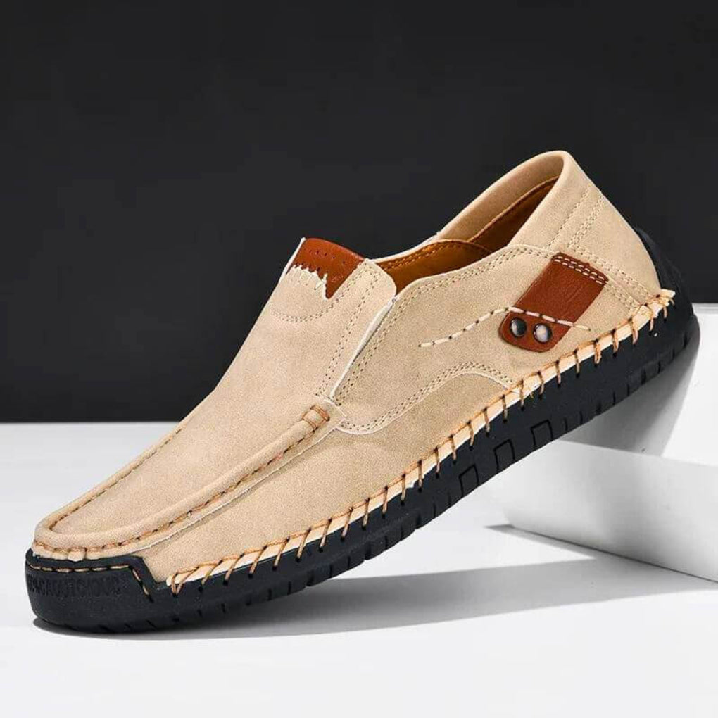 Men's black slip-on shoes with superior arch support for ultimate comfort.