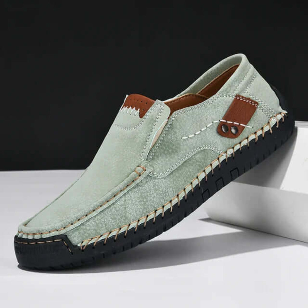 Stylish and practical men's slip-on shoes offering excellent arch support for all-day wear.