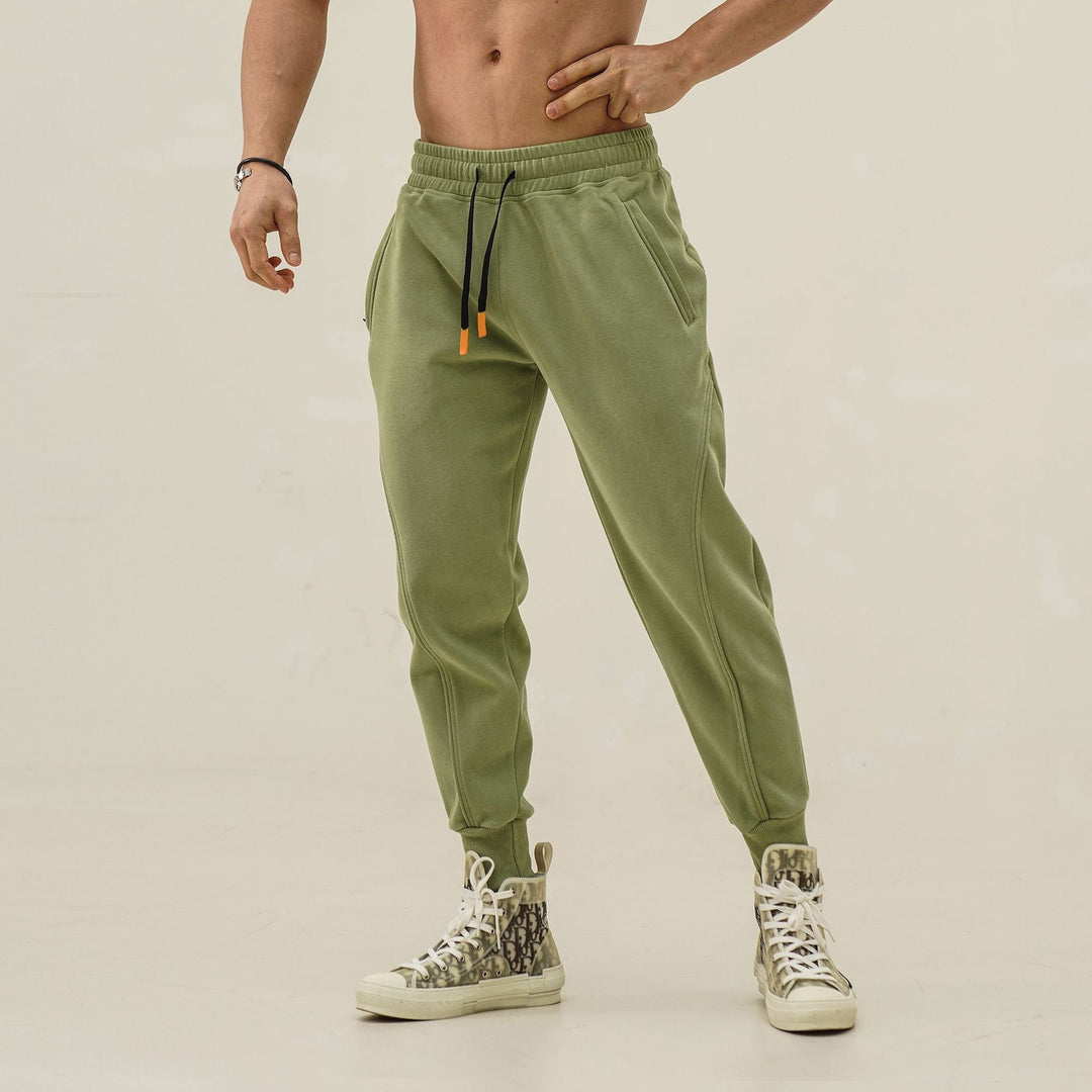 Casual men's sporty sweatpants with elastic waist and unique striped design, ultimate comfort.