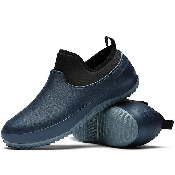 Close-up of men's waterproof slip-on work shoe sole, highlighting non-slip tread