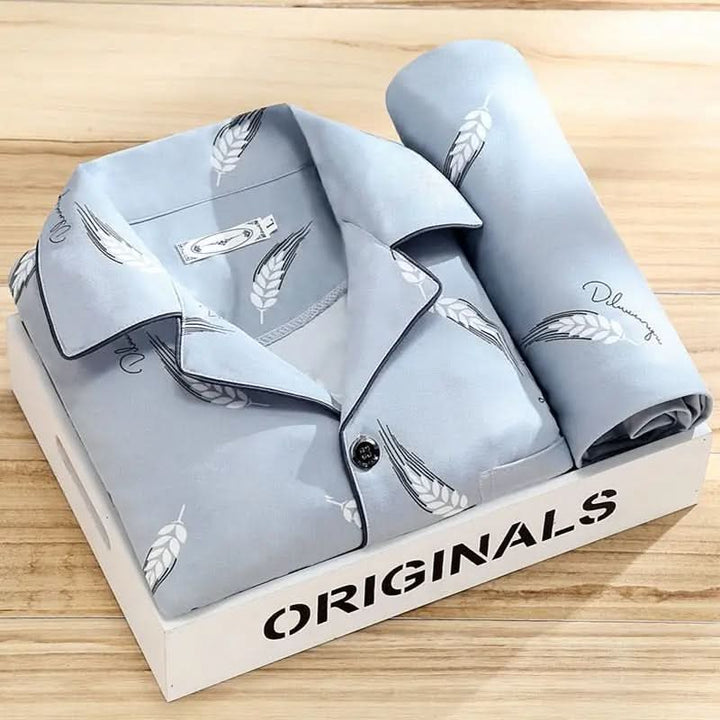 Men's blue button-up pajama set, soft and breathable sleepwear.