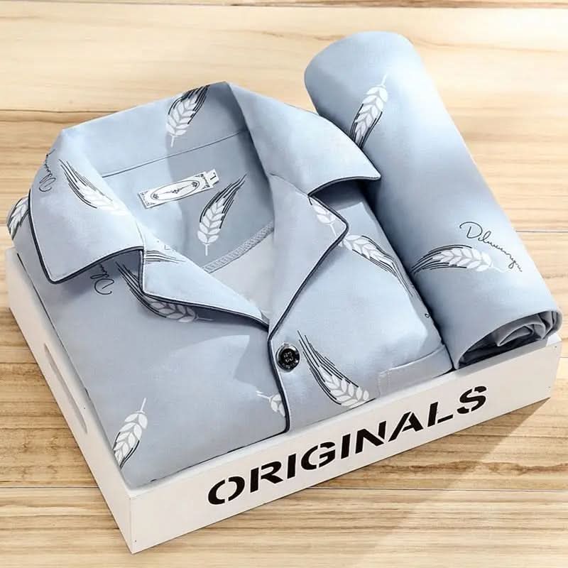 Close-up of men's soft cotton button-up pajama top with pocket.