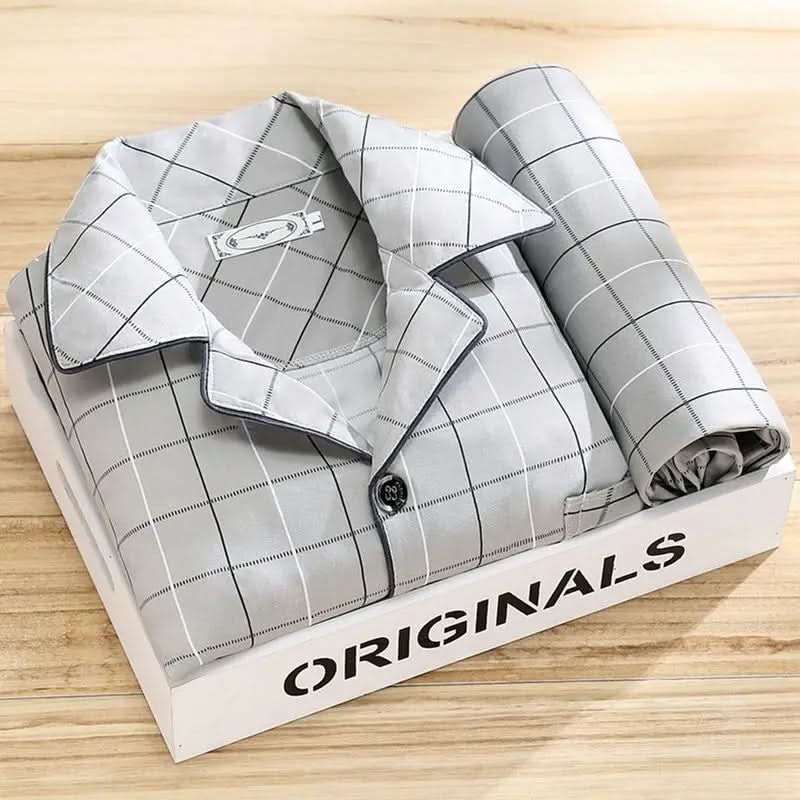 Men's classic button-up pajama set in navy blue, perfect gift.