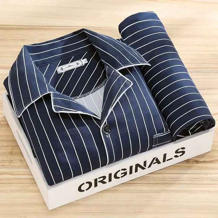 Relaxed man in soft men's sleepwear, enjoying comfort at home.