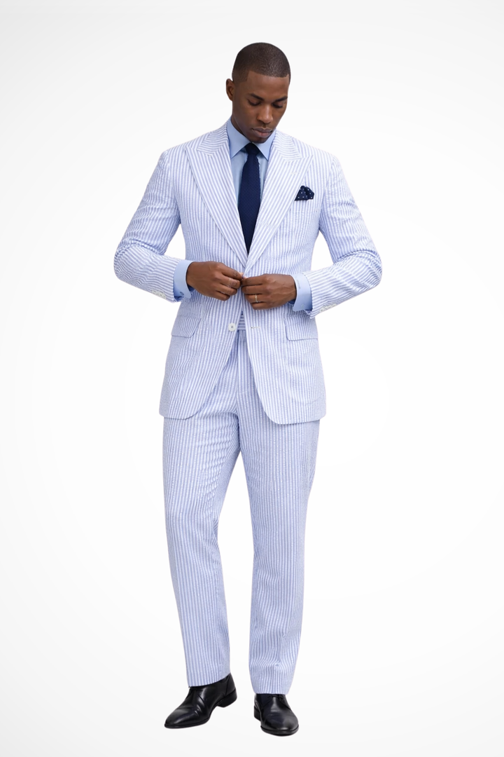 Men's blue striped formal two-piece suit with peaked lapels by Celeste London, tailored fit for occasion wear.