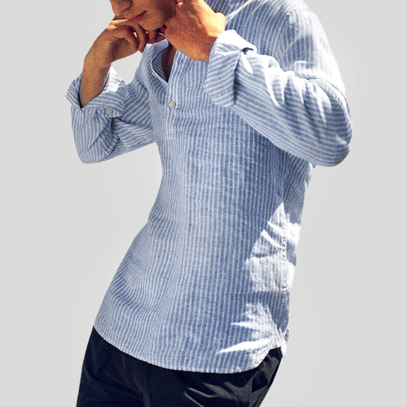 Red and white striped men's Henley shirt, relaxed fit, long sleeves, versatile for everyday comfort.
