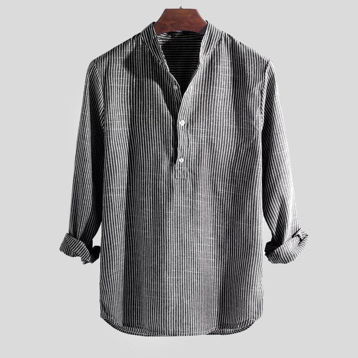Comfortable men's relaxed fit striped long sleeve Henley shirt, ideal for layering or casual everyday wear.